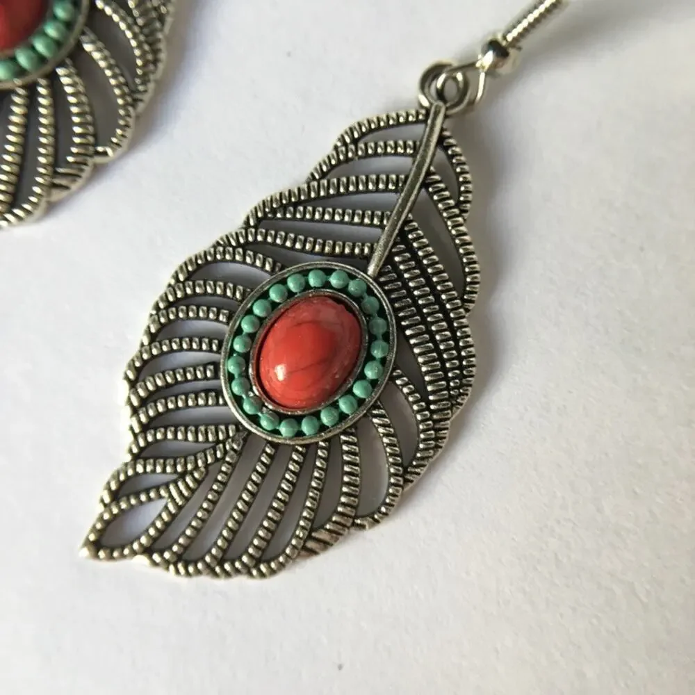 Silver tone feather earrings,  red cabochon & faux turquoise accents